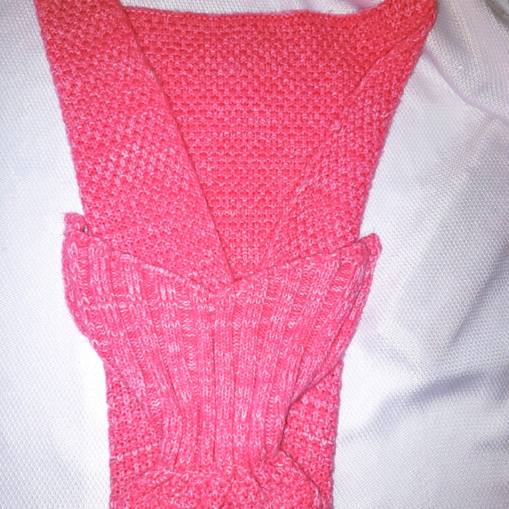 Pink knit mermaid tail blanket